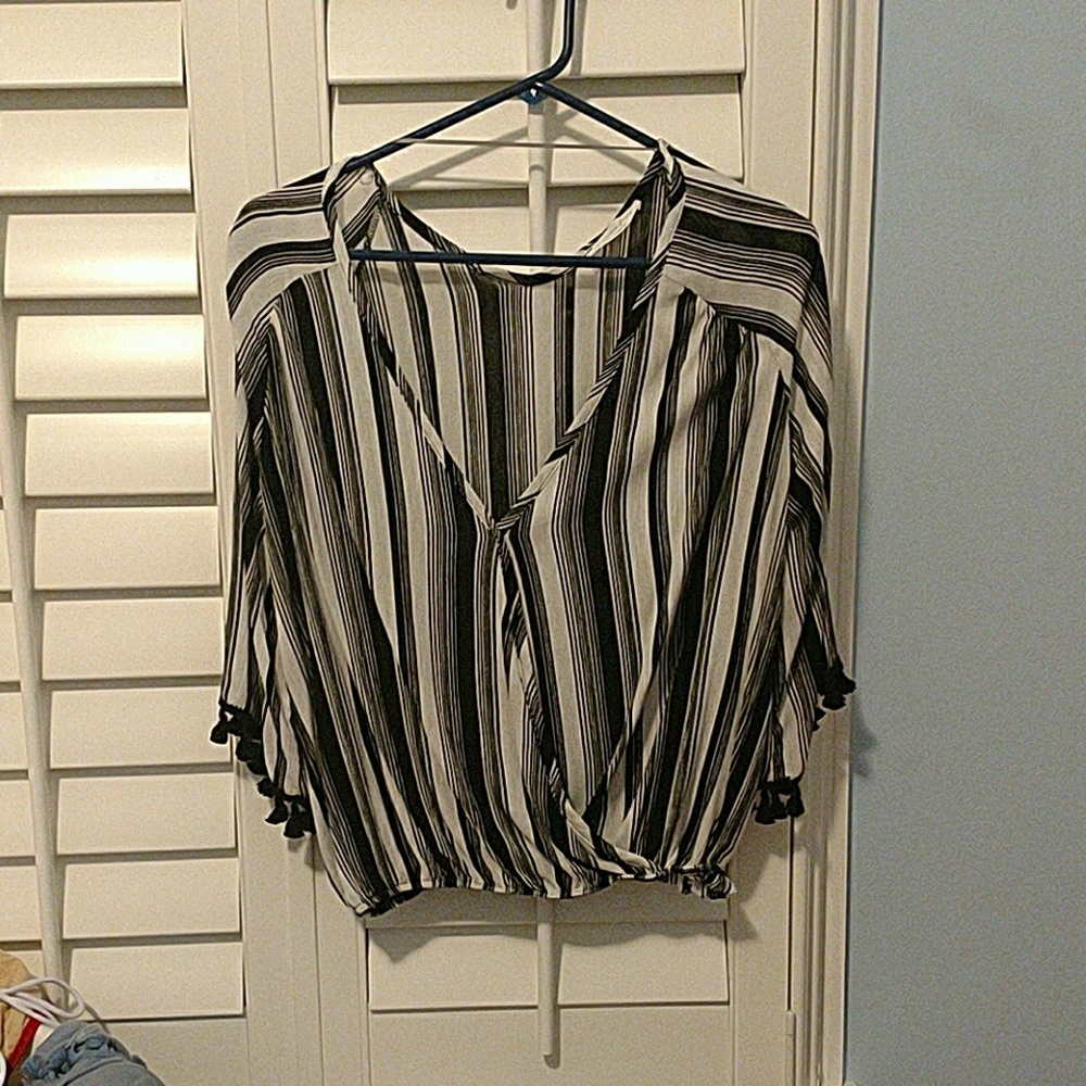 Long sleeve shirt with pom pom sleeves